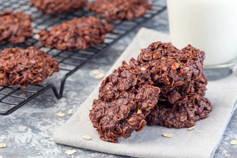 Flourless no bake peanut butter and oatmeal chocolate cookies, with glass of milk, vertical