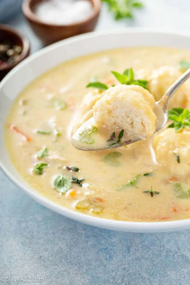 Chicken dumplings soup with cream and thyme
