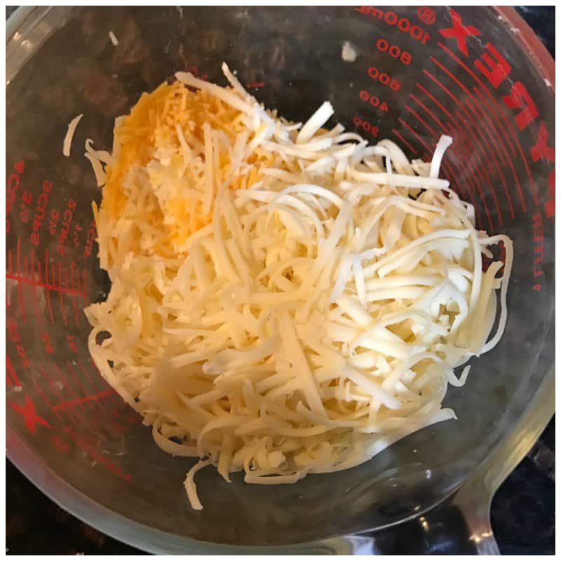 cheese in measuring cup for Low Carb Cheese Crackers 