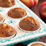 Apples and cinnamon muffins, selective focus