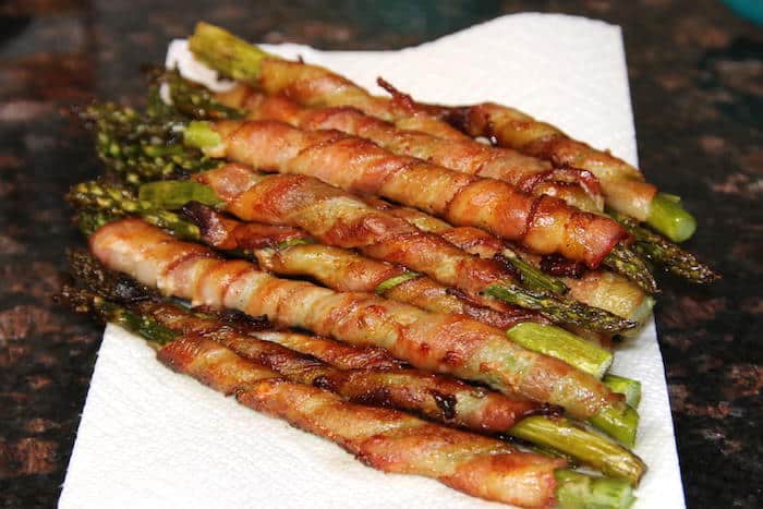 Keto Bacon Wrapped Asparagus made with a secret sauce!