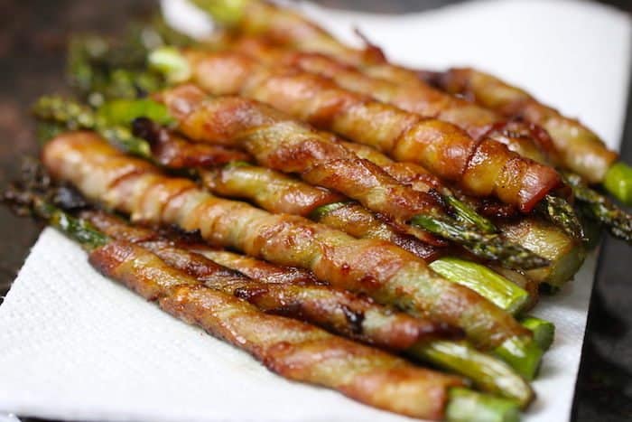 Keto Bacon Wrapped Asparagus made with a secret sauce!