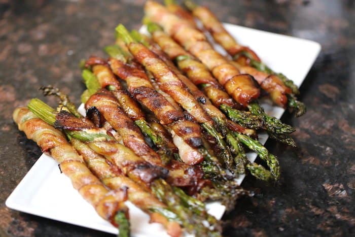 Keto Bacon Wrapped Asparagus made with a secret sauce!