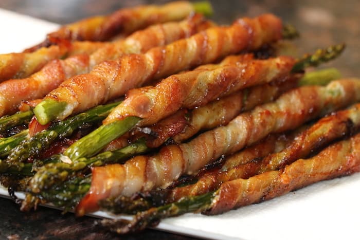 Keto Bacon Wrapped Asparagus Coated with a Secret Sauce!