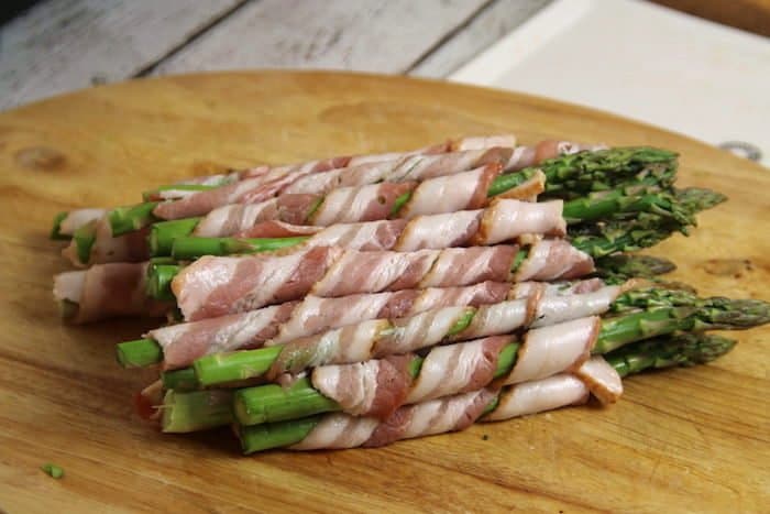 Keto Bacon Wrapped Asparagus made with a secret sauce!