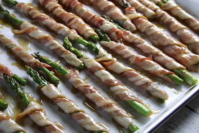 Keto Bacon Wrapped Asparagus made with a secret sauce!