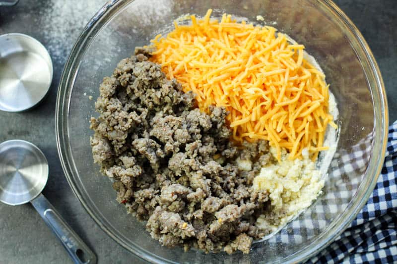 sausage and cheese on a mixing bowl