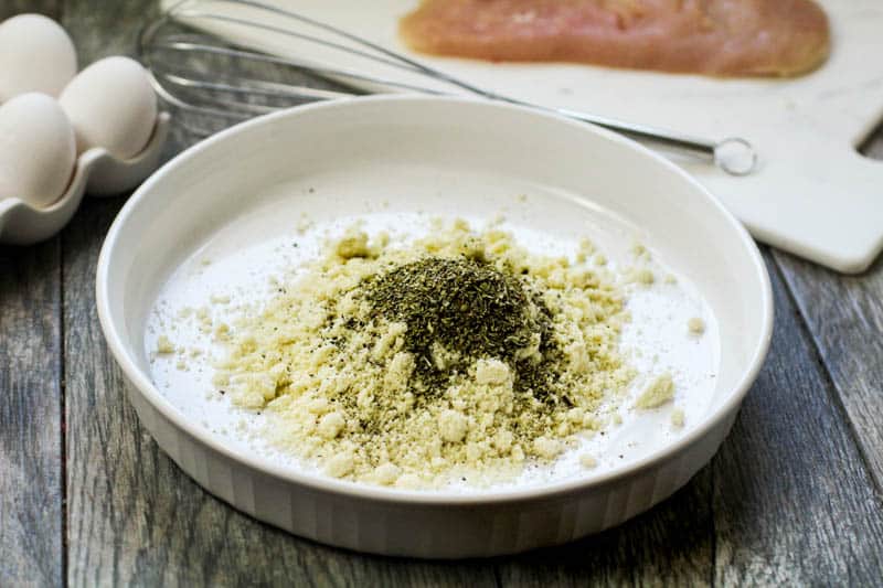 almond flour with seasonings in a white bowl