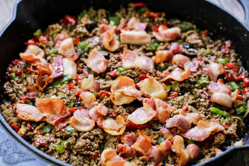 Ground meat mixture with bacon in a pan
