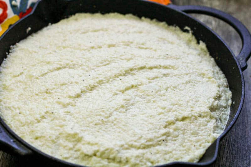 Cauliflower mashed in a pan.