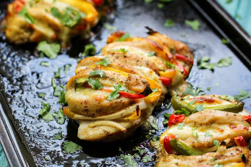 Keto Stuffed Chicken recipe on a black background