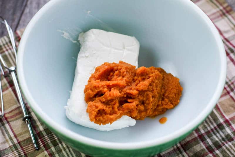 Pumpkin puree and cream cheese in a bowl