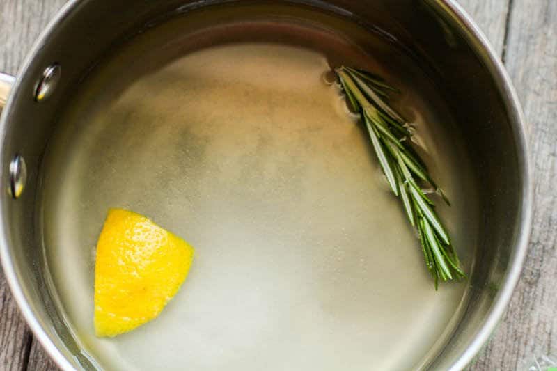 water and herb in pan in water 