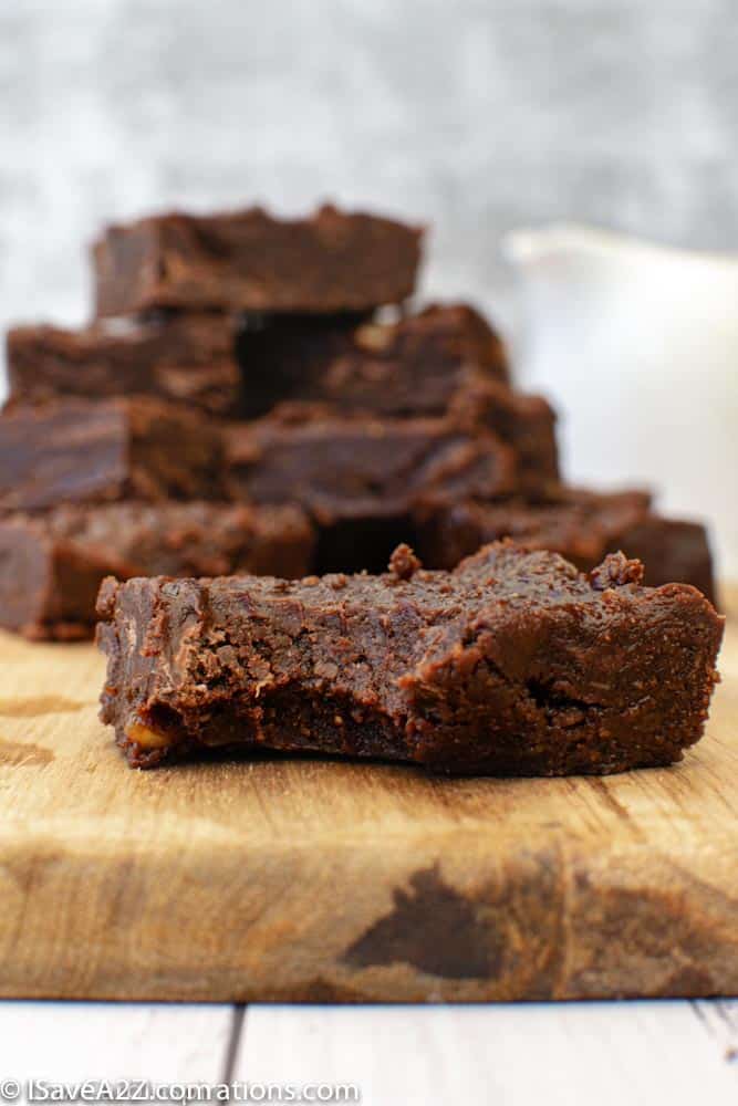 close up of Sugar-free Chocolate Fudge on a wood cutting board