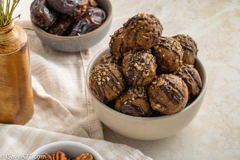 close up of pecan pie truffles in a white bowl
