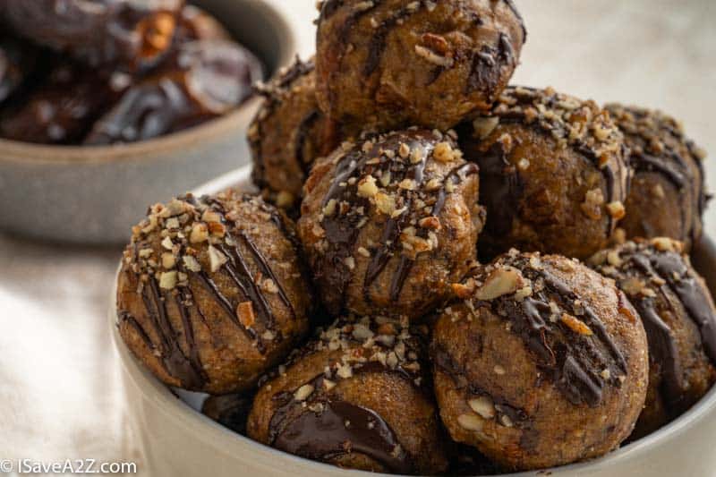 close up of pecan pie truffles in a white bowl