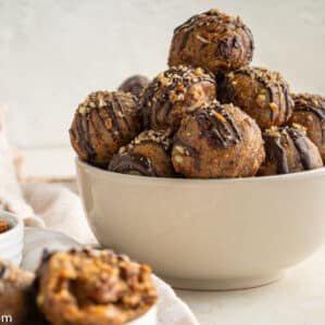 side photo of pecan pie truffle balls in a white bowl
