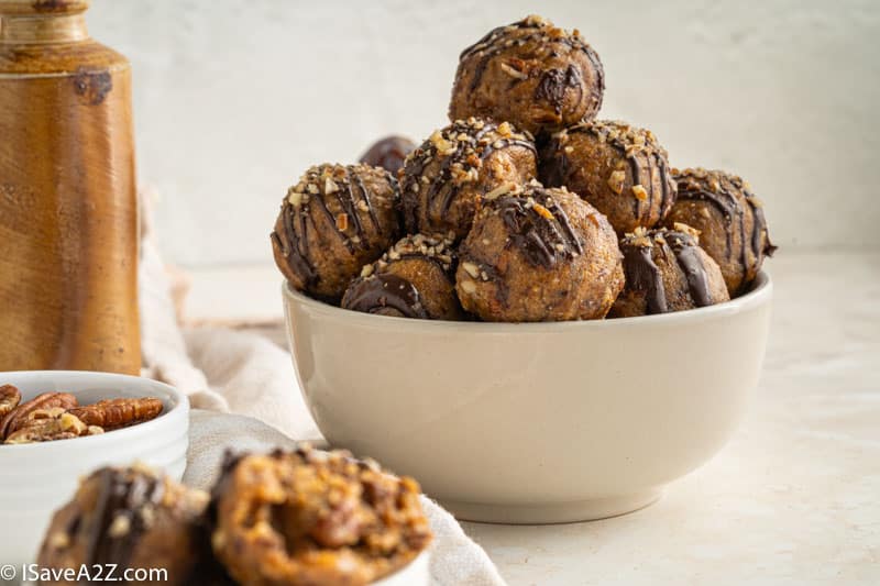 side photo of pecan pie truffle balls in a white bowl