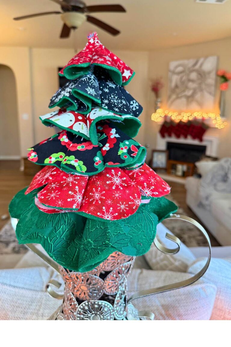 Fabric Christmas Tree completed and displayed on top of a vase