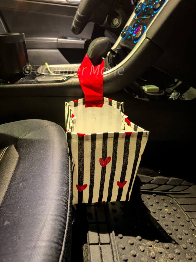DIY Trash Basket made of fabric table runner placed in my car